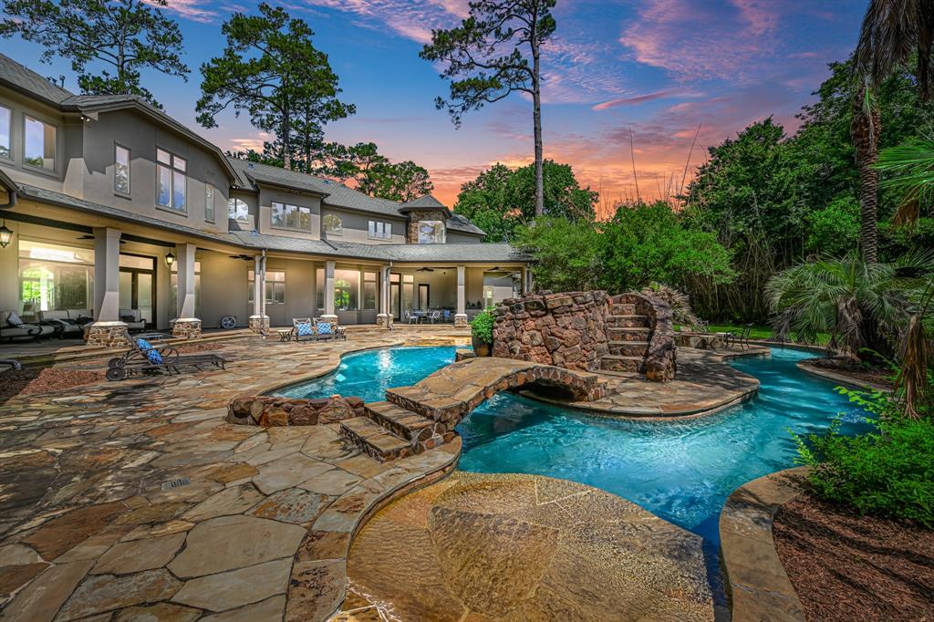 Poolside twilight at 11702 Forest Glen Street, a past Tricia Turner listing